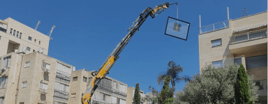 הרמת זכוכיות בעזרת מנוף ונטוזה